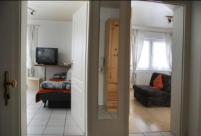 Гостиница Appartements & Ferienwohnungen Wolf  Узинген